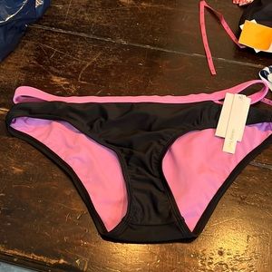 Brand new, swim bottoms, large
